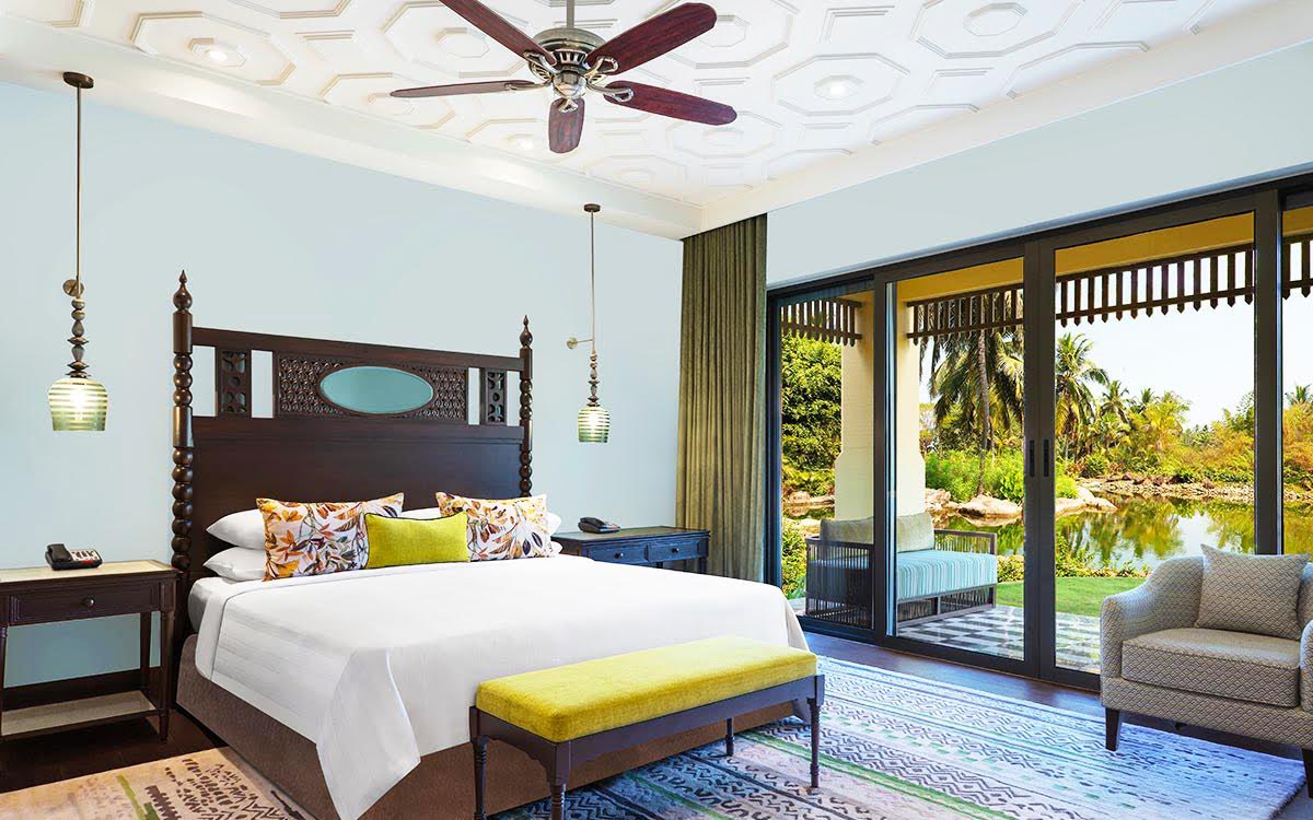 ITCHotels's tweet photo. Experience a destination getaway overlooking a serene tropical oasis. From the #lagoonview room at #ITCGrandGoa, discover pristine views of the lush green nature with a tranquil lake and azure skies, melded perfectly with Indo-Portuguese #architecture.

#ResponsibleLuxury #Goa https://t.co/EAxnJz8aND