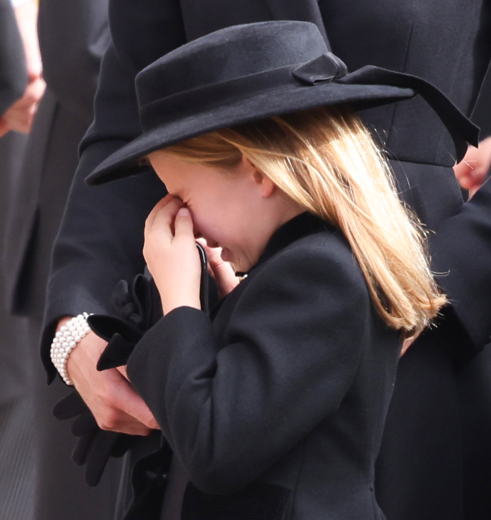 etnow's tweet photo. A heartbroken Princess Charlotte of Wales is seen crying at the funeral of her late great grandmother, Queen Elizabeth II. 

(📸: Getty Images) https://t.co/YOTK3QS4KA
