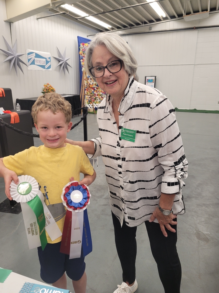 Congratulation Lachlan as he won the horticulture sweepstakes award (for the most blue ribbons) and the youth achievement award. He entered squash, cucumber, tomatoes, rhubarb and scarlet runner beans and house plants in our state fair. <a href="/schoolgardening/">School Gardening Success</a> #GardeningFun