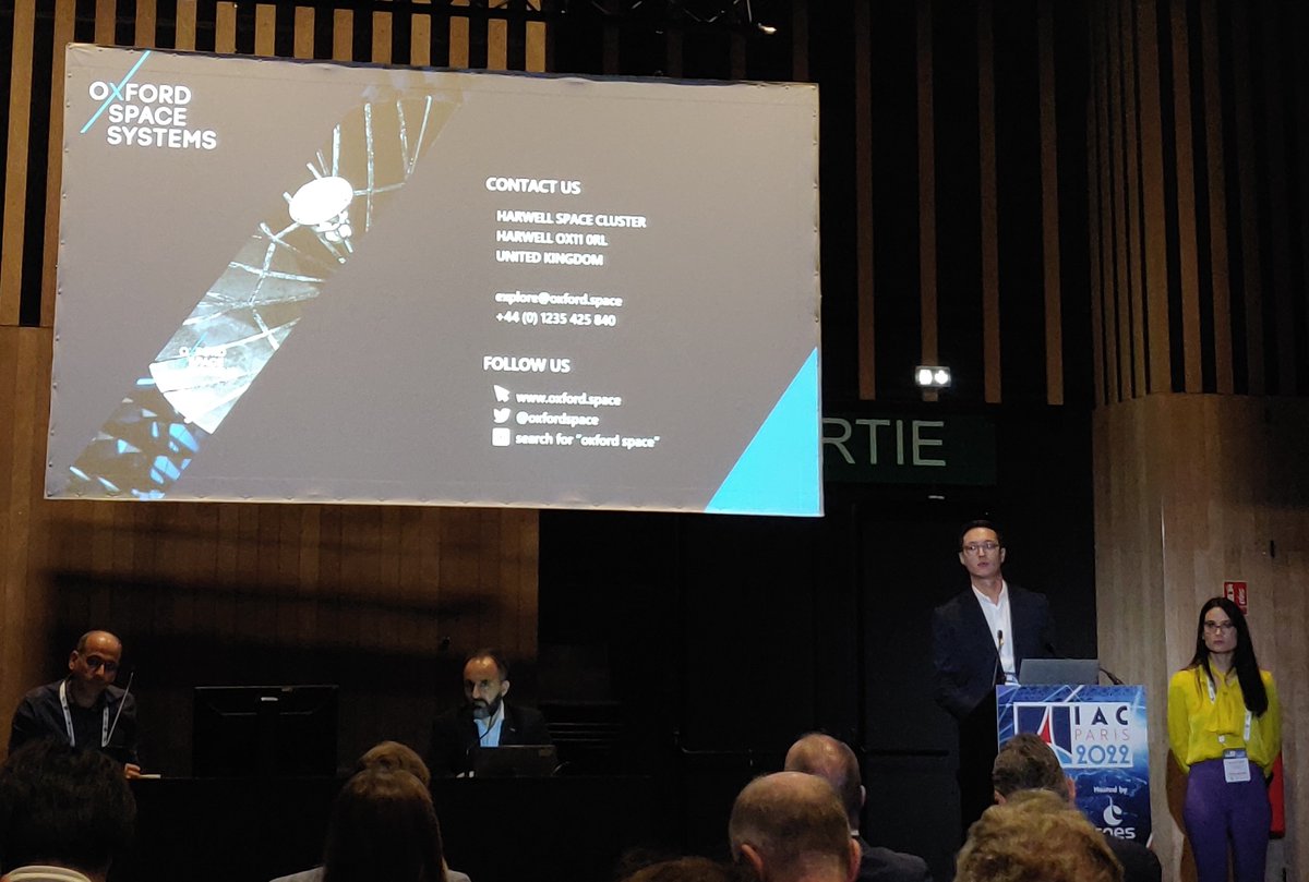 OxfordSpace's tweet photo. Our #Origami inspired deployable #ReflectArray development presented today @IACParis2022 by Aloisia Russo &amp; Ken Kitsu, both R&amp;D Engineers at @OxfordSpace and experts in origami! 
More to hear about our recent development on Wed. 21st at 2pm (IP session,screen 26). See you there! https://t.co/dRMizO36HK