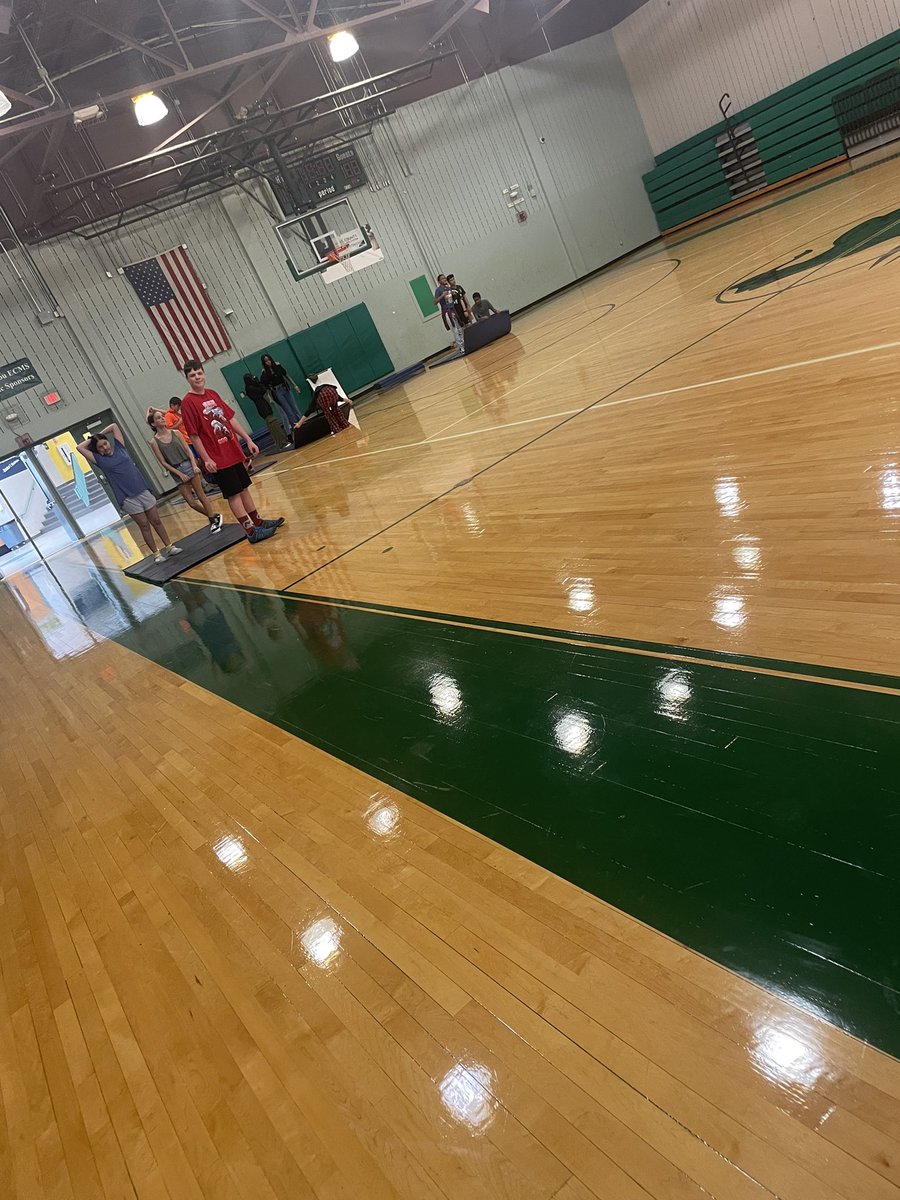 jamckoy1's tweet photo. Team Building week in PE and these scholars are working hard to make it across the gym with 1 fitness mat and 2 Polly circles! #eastcaryimps #ecms https://t.co/8NKG6Ke1Uq
