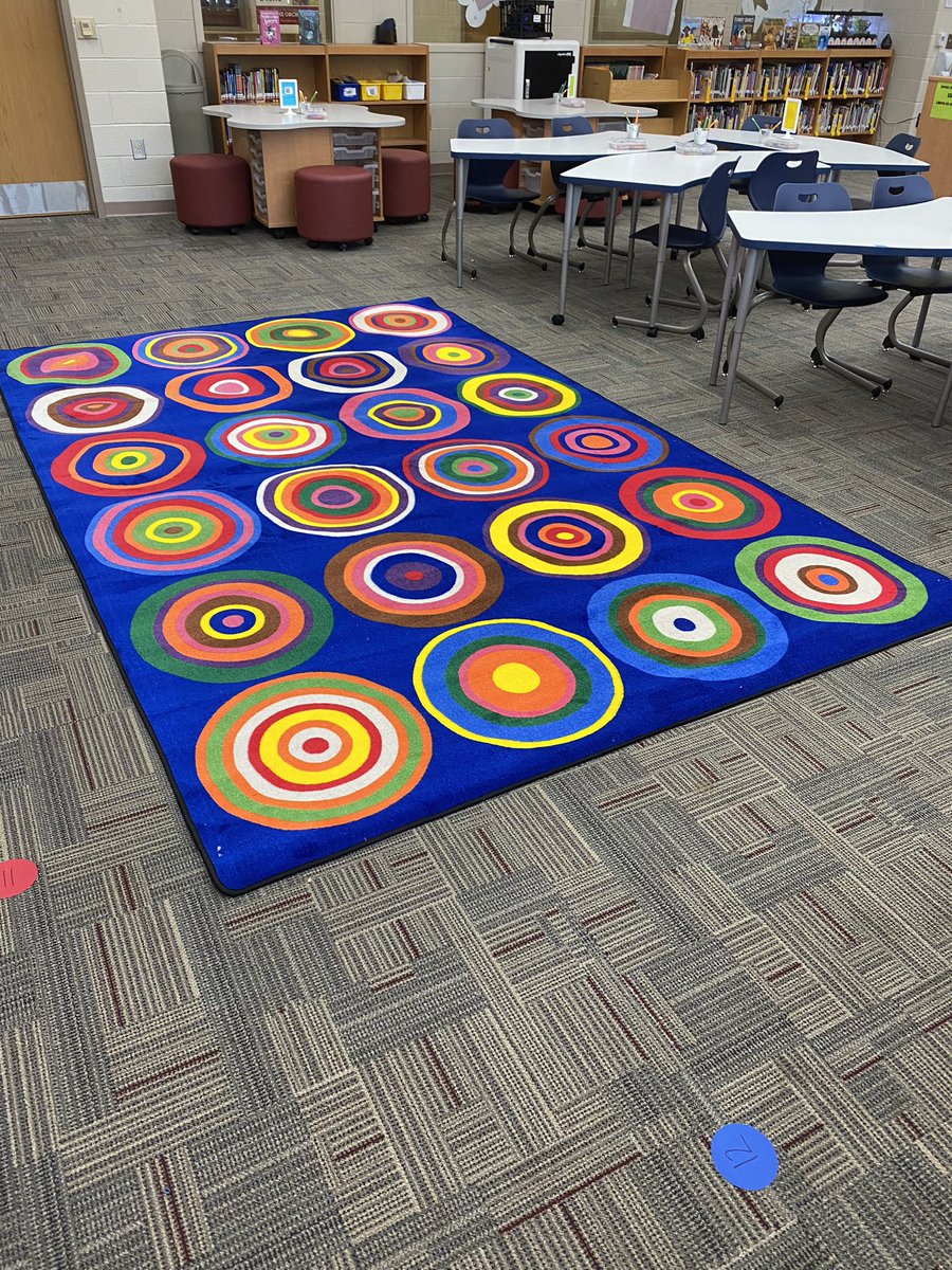 So excited for our beautiful new rug in the @E_B_Ellington library! Such fun colors!