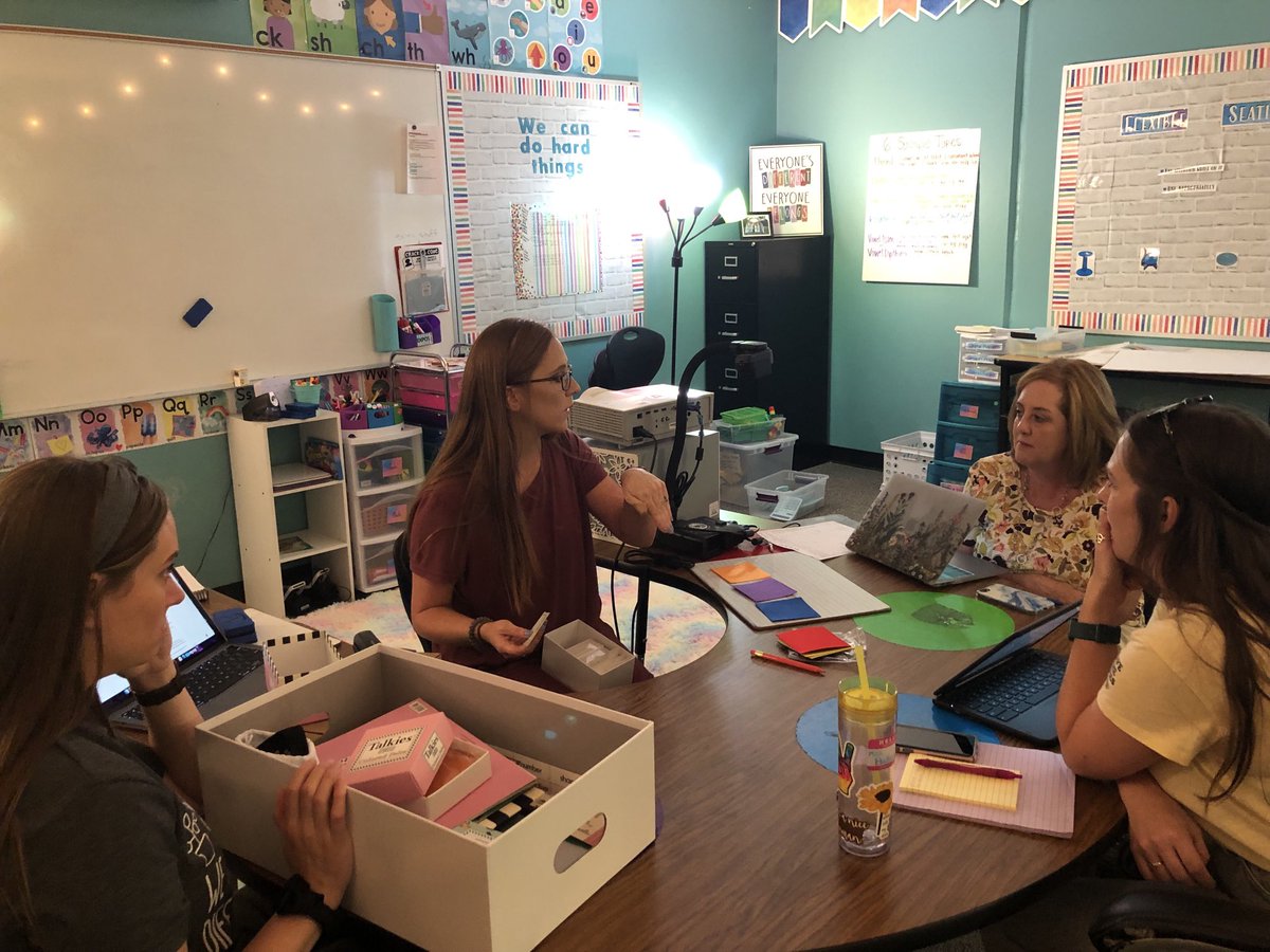 RiverPlaceTitan's tweet photo. The best PD is the teacher down the hall. Our SPED lead, Lauren McDowell, teaching the team who serves a Ss about Talkies. #embeddedPD #RPEbuildsPRIDE #TeamGame https://t.co/3N6wKJgDh5