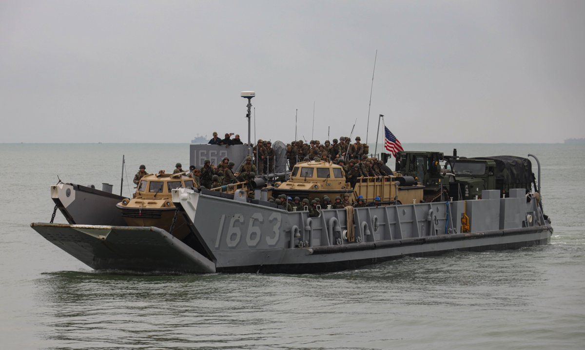 USMC's tweet photo. U.S. and Brazilian #Marines conduct an amphibious landing as part of exercise UNITAS LXIII in Itaoca, Brazil, Sept. 16. 

#UNITAS focuses on promoting peace, stability, and prosperity in the @Southcom area of responsibility. 

#CombinedForce #AlliesAndPartners https://t.co/ShkzIobFRC
