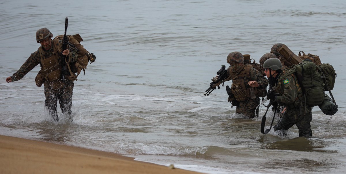 USMC's tweet photo. U.S. and Brazilian #Marines conduct an amphibious landing as part of exercise UNITAS LXIII in Itaoca, Brazil, Sept. 16. 

#UNITAS focuses on promoting peace, stability, and prosperity in the @Southcom area of responsibility. 

#CombinedForce #AlliesAndPartners https://t.co/ShkzIobFRC