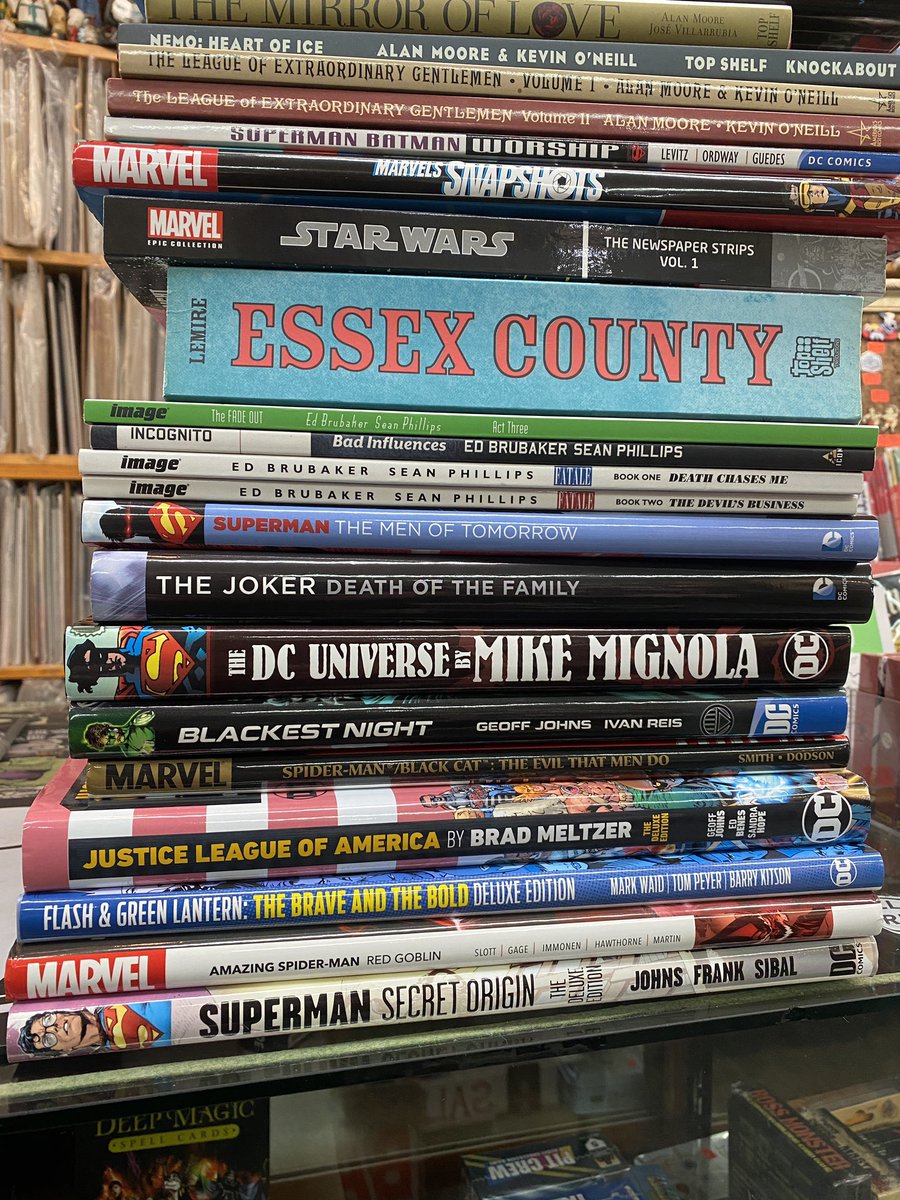 strangeadventrz's tweet photo. more for the bargain rack of doooom and #previouslyviewed graphic novels https://t.co/gkYBvYVm6c