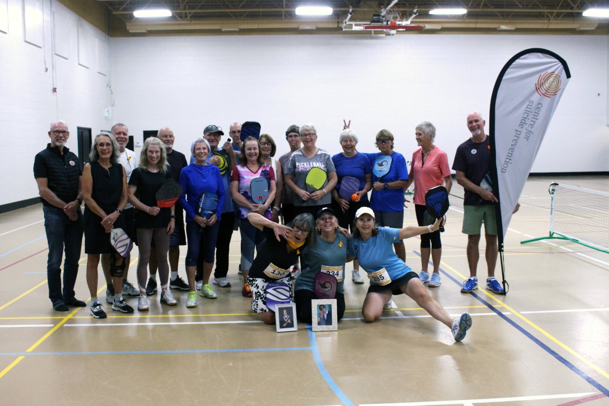 cspyyc's tweet photo. Pickleball for Life - currently tied as the largest #RunforLife2022 team - came together this morning to play Pickleball, share refreshments and remember loved ones lost to suicide 🧡 https://t.co/OIyBp6RkpU