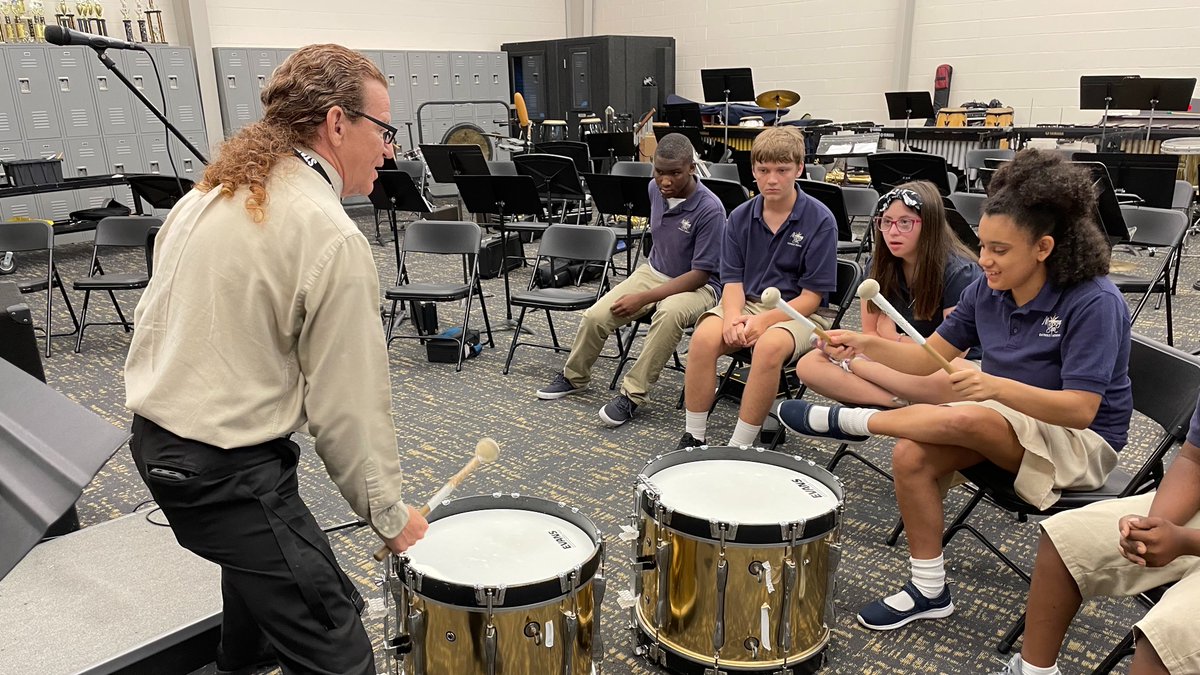 MSCatholicOrl's tweet photo. We love our partnership with Bishop Moore Catholic High School! Our high schoolers enjoy attending Band with Mr. Barker and learning about the different instruments. https://t.co/tho0Nog0BQ