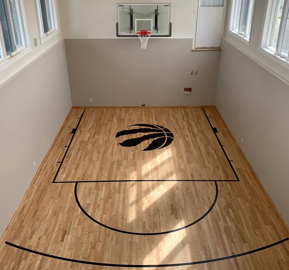 New KTL Hevea wood installation. This private residence now has an incredible court right in their house!! Very cool space to play ball.