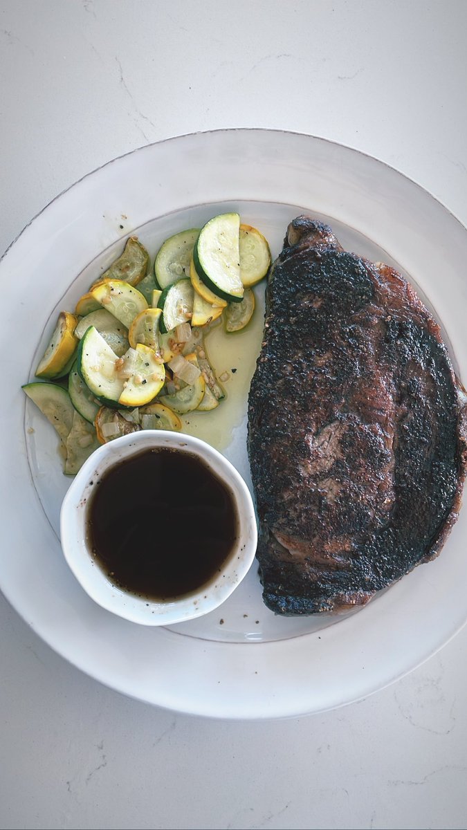 eatsbyparker's tweet photo. cowboy coffee and pork rind rubbed ribeye with au jus. lemon garlic squash and zucchini with onions. https://t.co/ShHazLHd6t