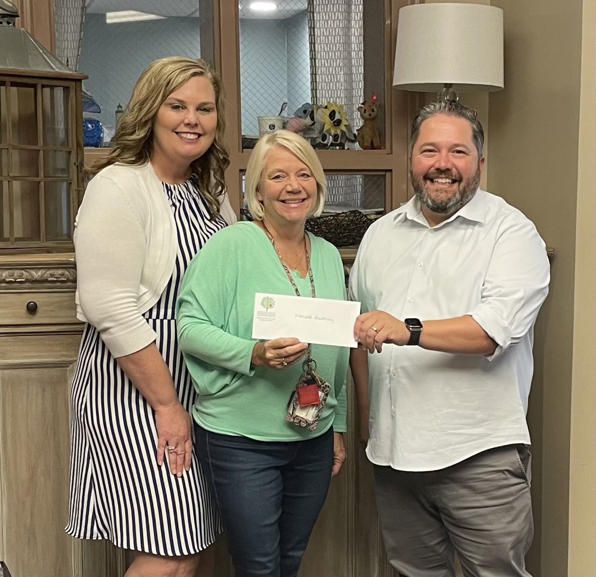 HooverCSF's tweet photo. Board member Lucas Dorion presents Riverchase Elementary principal Dr. Turney and STEAM teacher Ms. Wilson with their check from the Foundation for The Hovercraft Project! #educatingtogether #hoovecsf #partnersineducation #riverchaseelementary https://t.co/rCGFkGrRd5