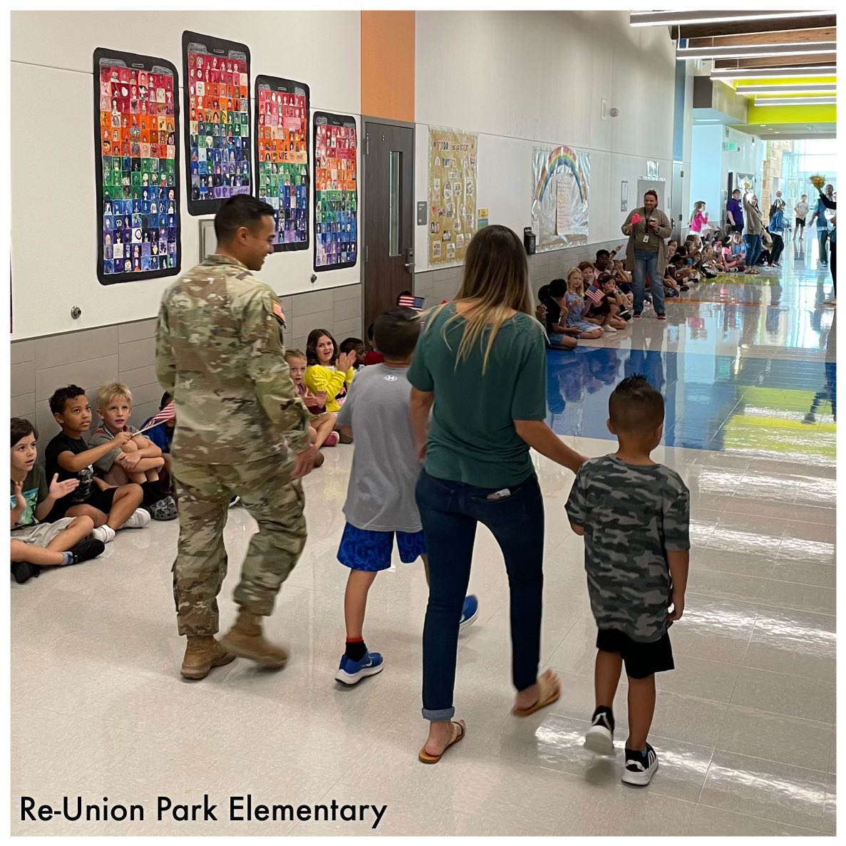 LorenaS85614044's tweet photo. Staff Sergeant Aristondo received a warm Re-UNION from of our staff after being deployed for a year. It’s been so fun working with Mrs. Aristondo, first grade teacher keeping it a surprise for her two boys! #RootedTogether @KarstenMitchell @jsruss68 https://t.co/LjCkYqUDm9