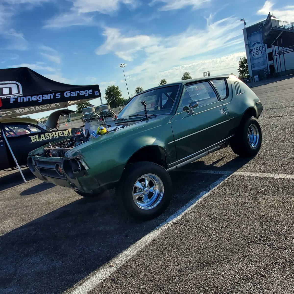 MonMornRacer's tweet photo. DEVELOPING: The Blasphemi in @hotrodmagazine Drag Week is in the pits of @WWTRaceway undergoing a motor swap. The Gremlin will offer up its hemi for the gasser. @MotorTrend #HotRodDragWeek2022 #HotRodding #Day1DragWeek #DragRacing https://t.co/DQgWWuQkh0