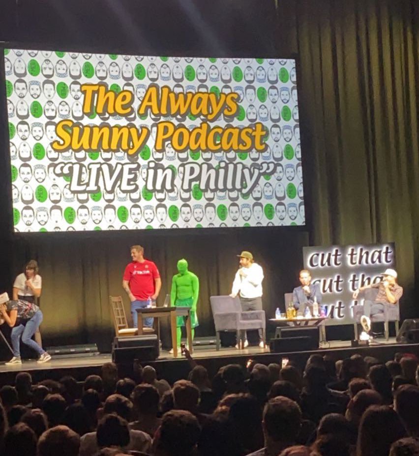 WrexhamUSA's tweet image. One of our own #WrexPat @jamietlewis on stage with @RMcElhenney in #TheRedOne at @TheSunnyPodcast Live in Philly!