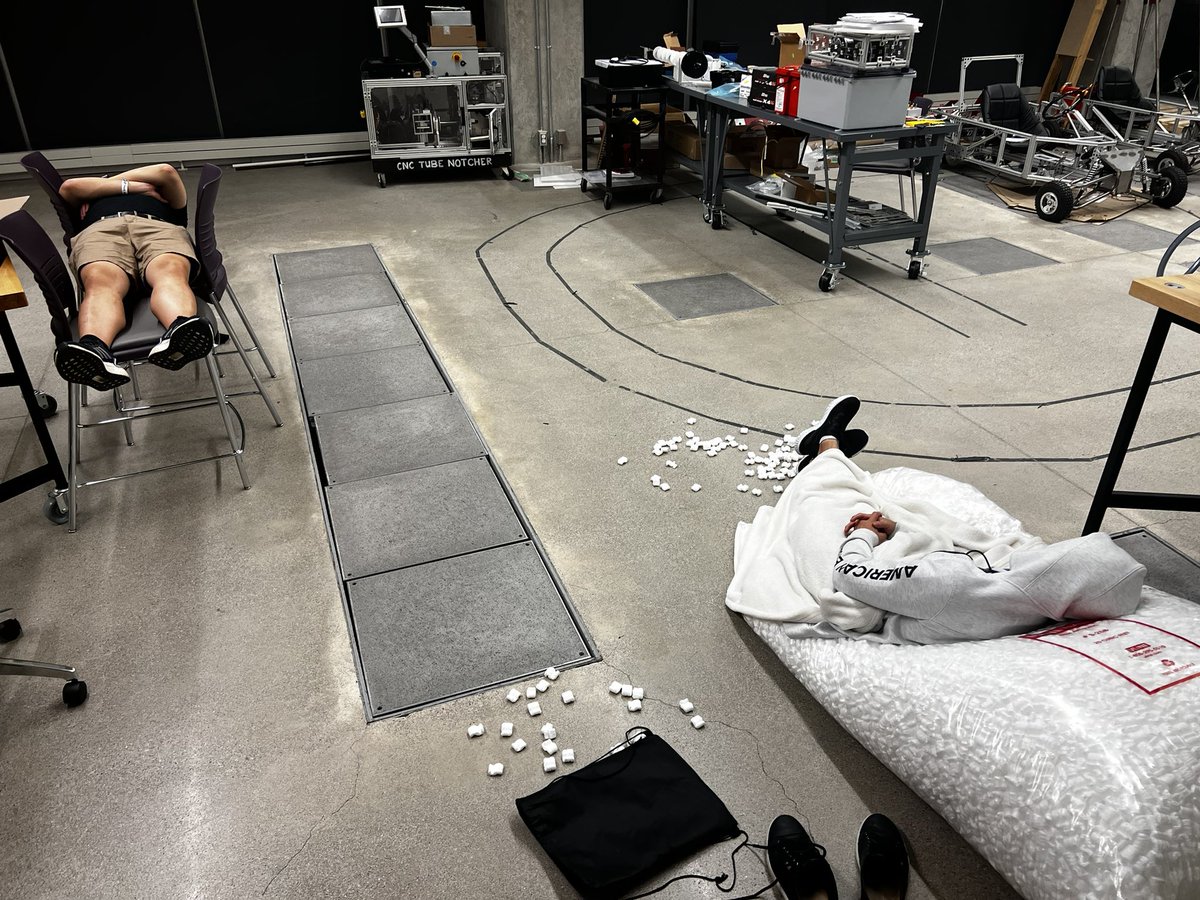 rishiosaur's tweet photo. bonus pics from the weekend: our makeshift sleeping setup next to the mech lab https://t.co/Qf5FY5pz9H