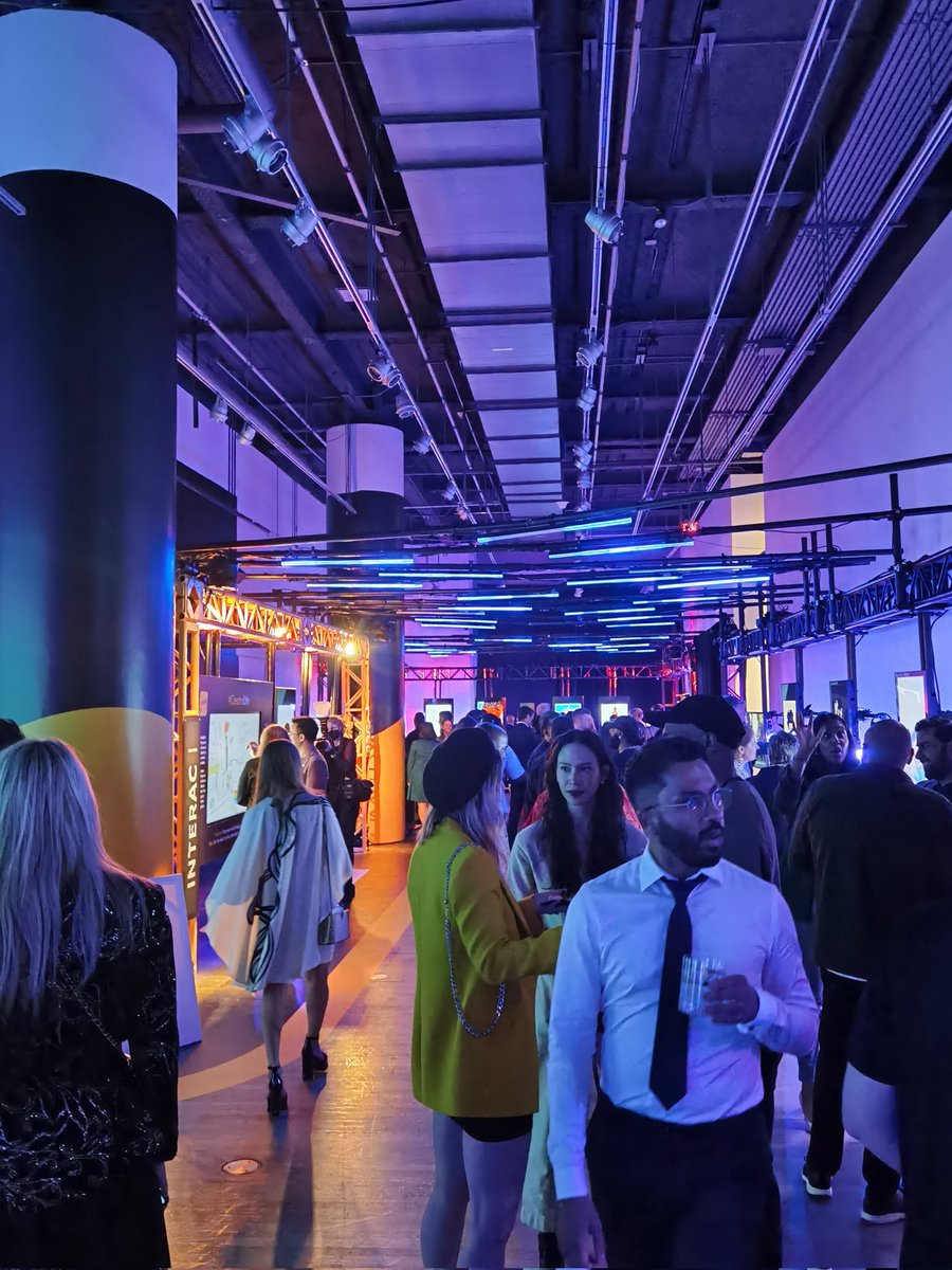 MoVernie's tweet photo. On the MOVE @ VIP Party at Elevate #NFT Art Gallery, sponsored by #Interac.
Open bar, hors d'oeuvres, live music, digital art.
Perfect way to kick off #ElevateTechConference starting tomorrow.
#Elevate #elevatetechfest #nftartgallery #nfts #nftcommunity #nftart #nftartist https://t.co/oQ950YO7gg