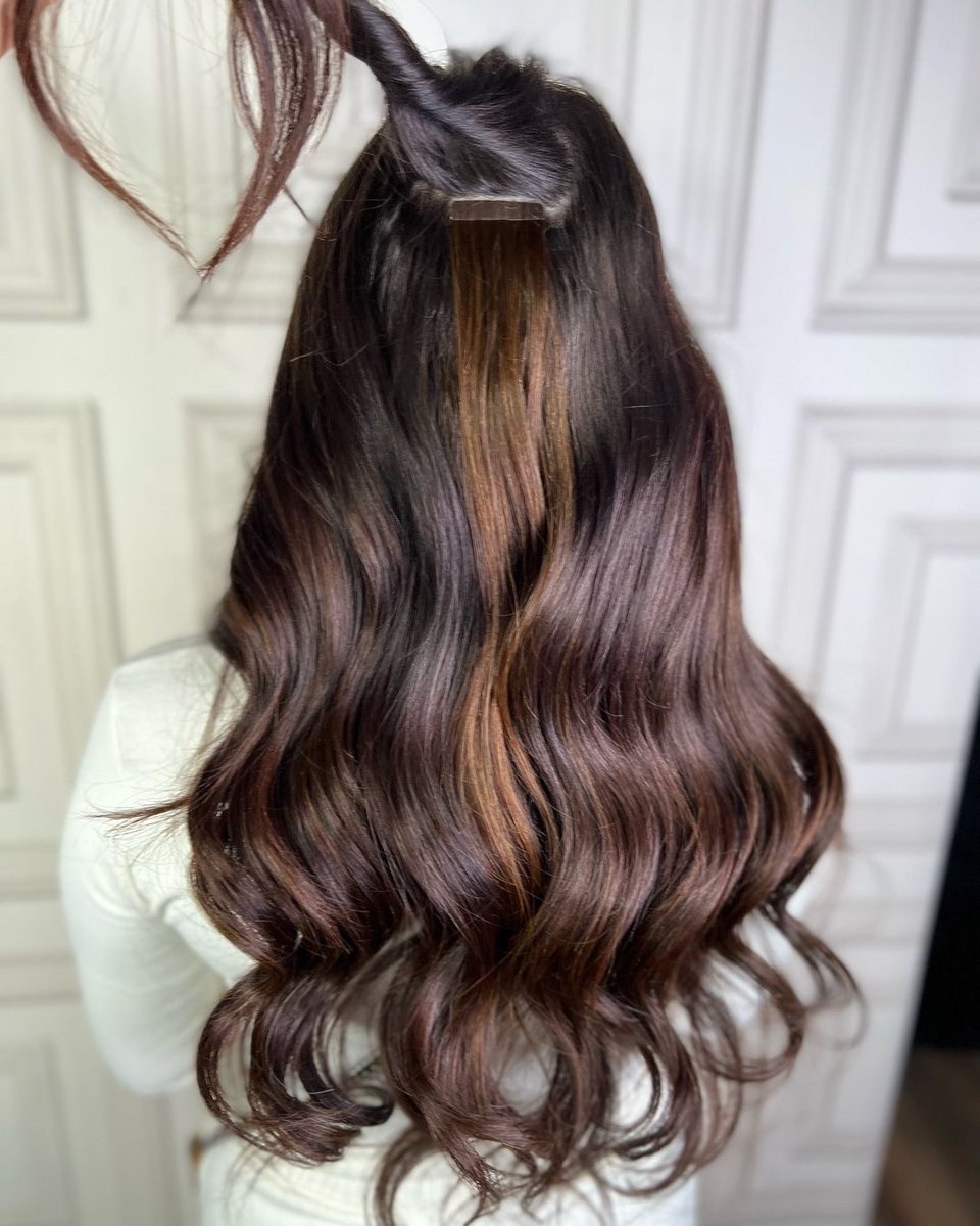 Posted <a href="/withregram/">Repost app</a> • @mbhairextensionist⁠
Under the hood 👀⁠
⁠
22” tape extensions in shades ‘1B’ ‘2’ &amp; ‘4’ to create subtle colour contrasts in the hair without dying it. ⁠
⁠
#zenhair #zenhairextensions #zenluxuryextensions