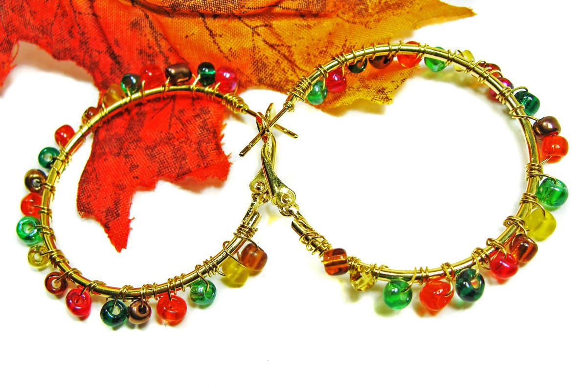 girliegals12's tweet photo. Colorful Autumn Colored Wire Wrapped & Wire Crocheted Goldtone Hoop Earrings: https://t.co/3xuXWhFmCK... #beadedearrings #hoopearrings #autumnjewelry #wirewrappedjewelry #wirecrochet #orange #red #green #topaz #teal #glassseedbeads #jewelryforher #etsyhandmade #supportsmallbiz https://t.co/FRFC8CiOMb
