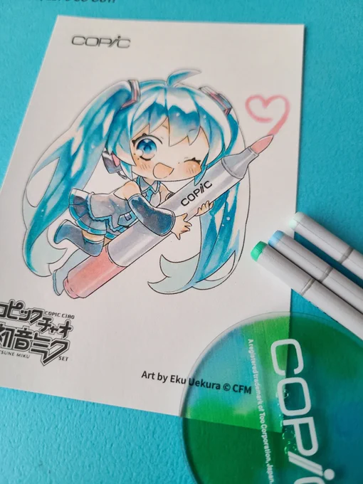 #コピックで初音ミクぬりえコンテスト ミクさんのデザインで、所々ピンクが入っているのが好きなので、髪や瞳、服などにもピンクを混ぜて描きました 