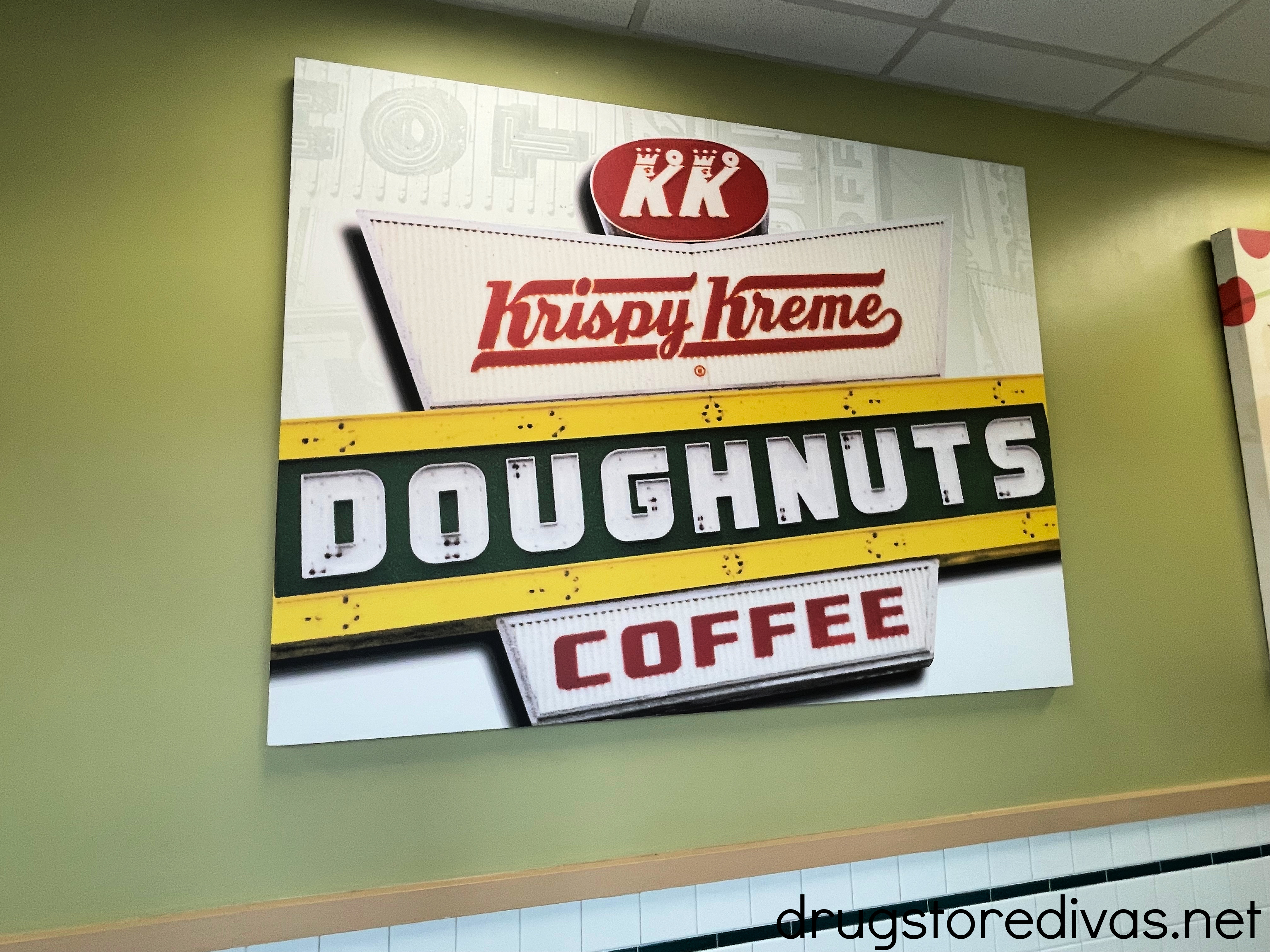 A sign in a Krispy Kreme Doughnuts store.