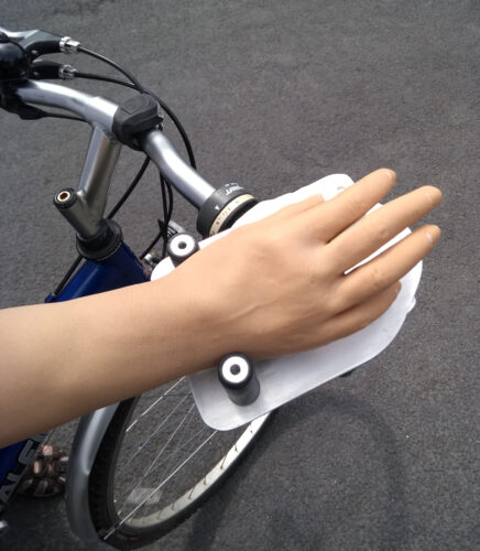 Abigail has always enjoyed riding her bike, but she wasn't confident resting her prosthetic hand on the bars.
 
So, our volunteers made this rotating hand rest, which helps her with the various positioning issues and allows her to lift her arm off the bike rest easily if needed.