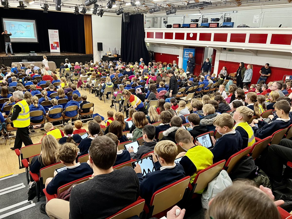 inspireSBC's tweet photo. What a fabulous morning as 500+ pupils had the chance to hear an inspirational talk from @DekkoComics. Fantastic to find out how comics can be used to help you learn and we had great fun putting this new knowledge into action! #weareinspirelearning @BordersBookFest #SchoolsDay https://t.co/EfVEwvXXnE