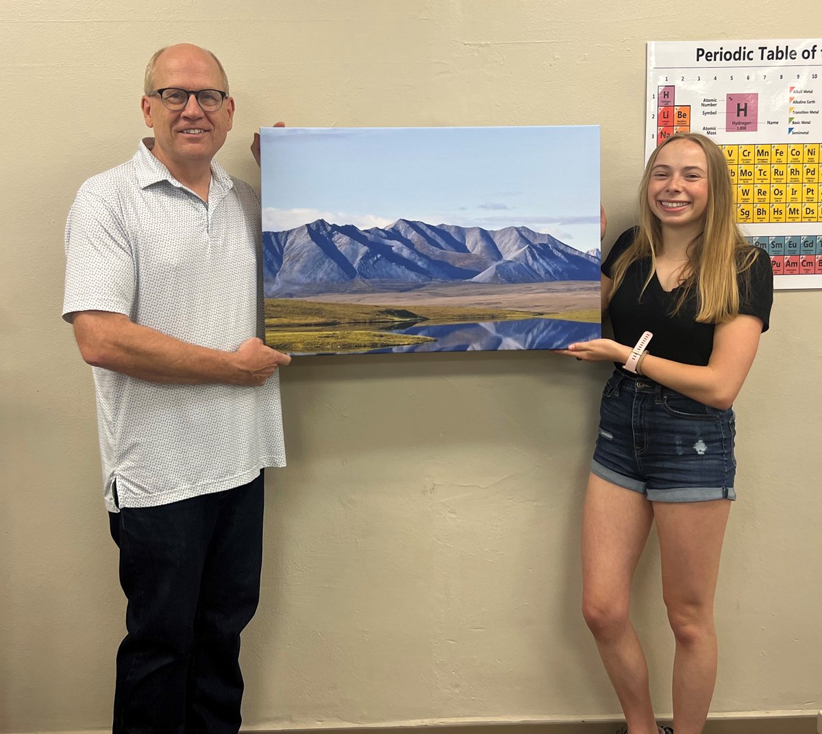 Congratulations to Laney Harner, winner of the 13th Annual Geology/Earth Sciences Student Photo Competition. Her winning photo is of North Slope, Borough, Alaska. Pictured here with Laney is Daniel Holm, Department Chair.