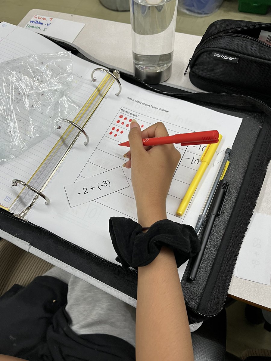 Coles_Math's tweet photo. Today was our first day adding integers with models and we did amazing! The students partnered up with question cards and a recording sheet and supported their partners through their work and helped them fix any mistakes. 
701, 702, and 703 are rockin their integer unit!! https://t.co/ox3Tdxtmz9