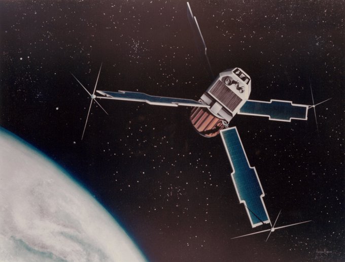 Artist's concept of the spacecraft Uhuru, the first x-ray observatory satellite, in orbit over the Earth.