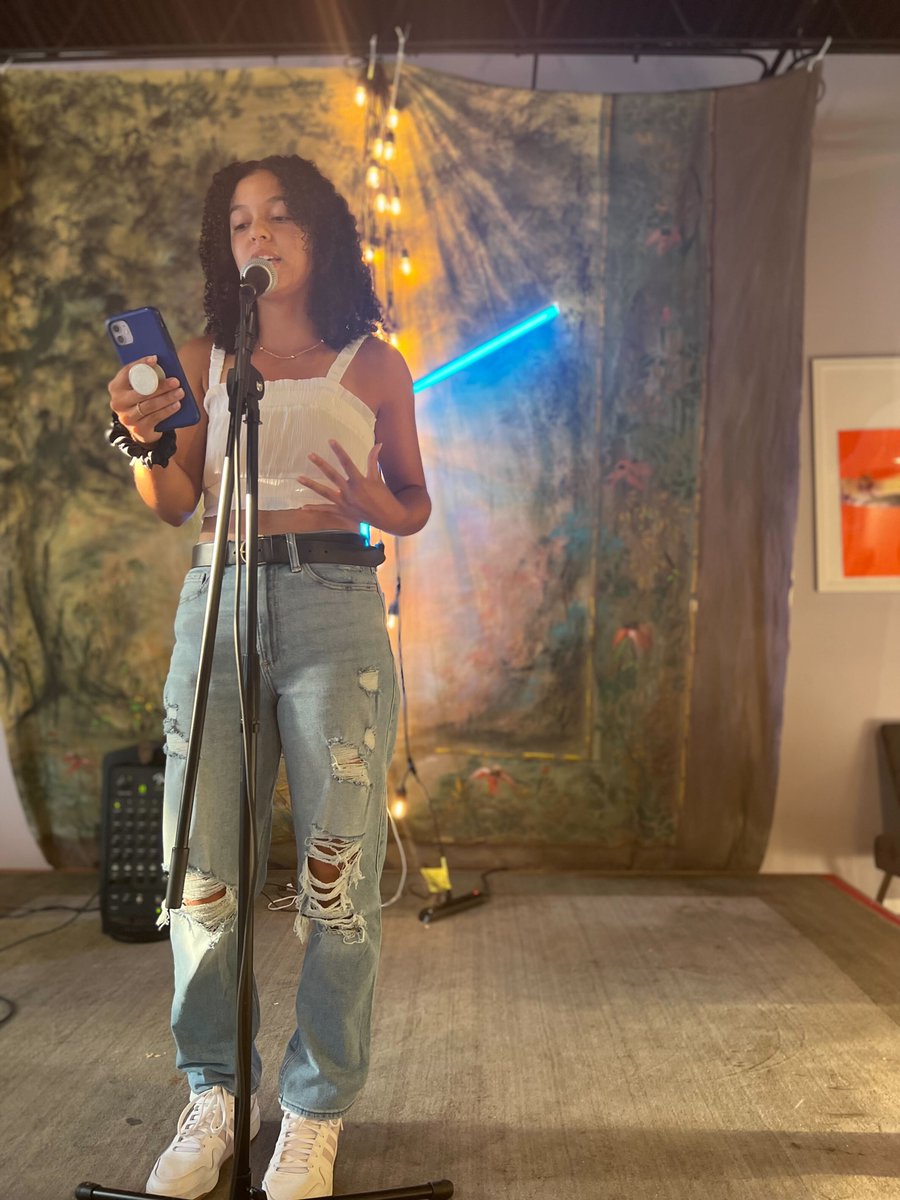 Youth Poets on stage at Mercantile Montrose performing at the 1st Free Verse event of the fall. 

Be sure to join us for the next Free Verse event at <a href="/gcccomics/">Gulf Coast Cosmos Comicbook Co.</a> October 8th 6PM-8PM CT. Youth poets must be between the ages of 13-19 to perform.