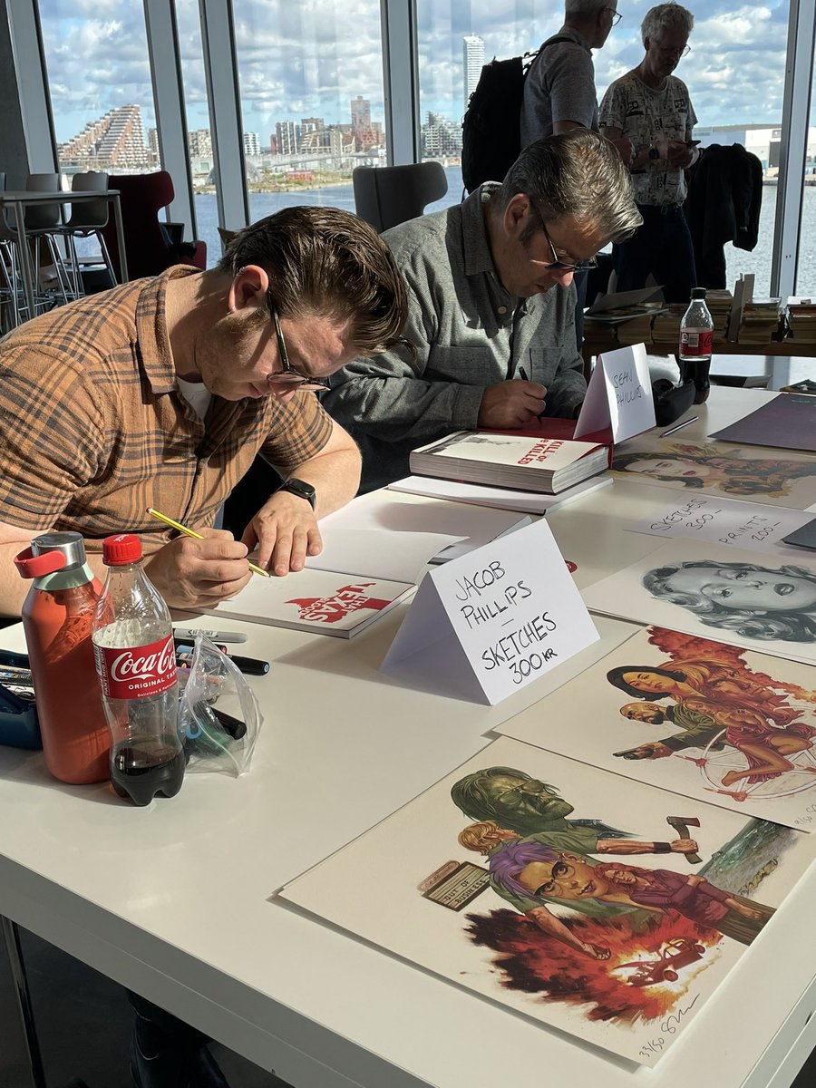 JimMahfood's tweet photo. The Phillips crew makin’ it happen. Damn good times with these talented gents! 
@jacobr_phillips @seanpphillips 
@artbubblefestival 
#denmark #aarhus #artbubble #festival #crew #comics #comicbooks #psychedelic #visualfunk #foodone #jimmahfood https://t.co/3q1UXEpCNe