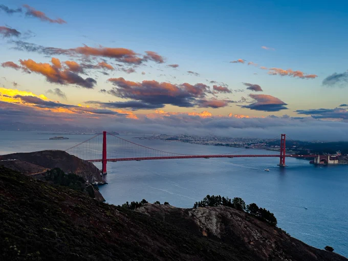 7pm bridge with sunset tipped clouds