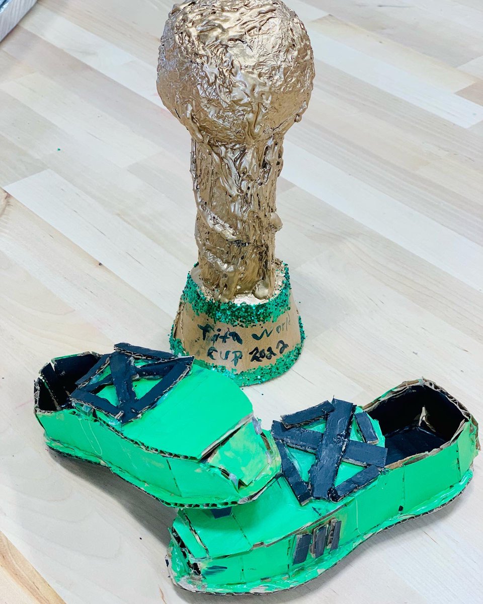 BSHSartstudio's tweet photo. Aright! These boys (6th grade) are finished with their collaborative 3D sculpture!! Nate built soccer cleats out of cardboard and Heyden made the World Cup using a top of a soda bottle, aluminum foil, hot glue, cardboard and spray paint to make the trophy. https://t.co/7iXWrxJ4OB