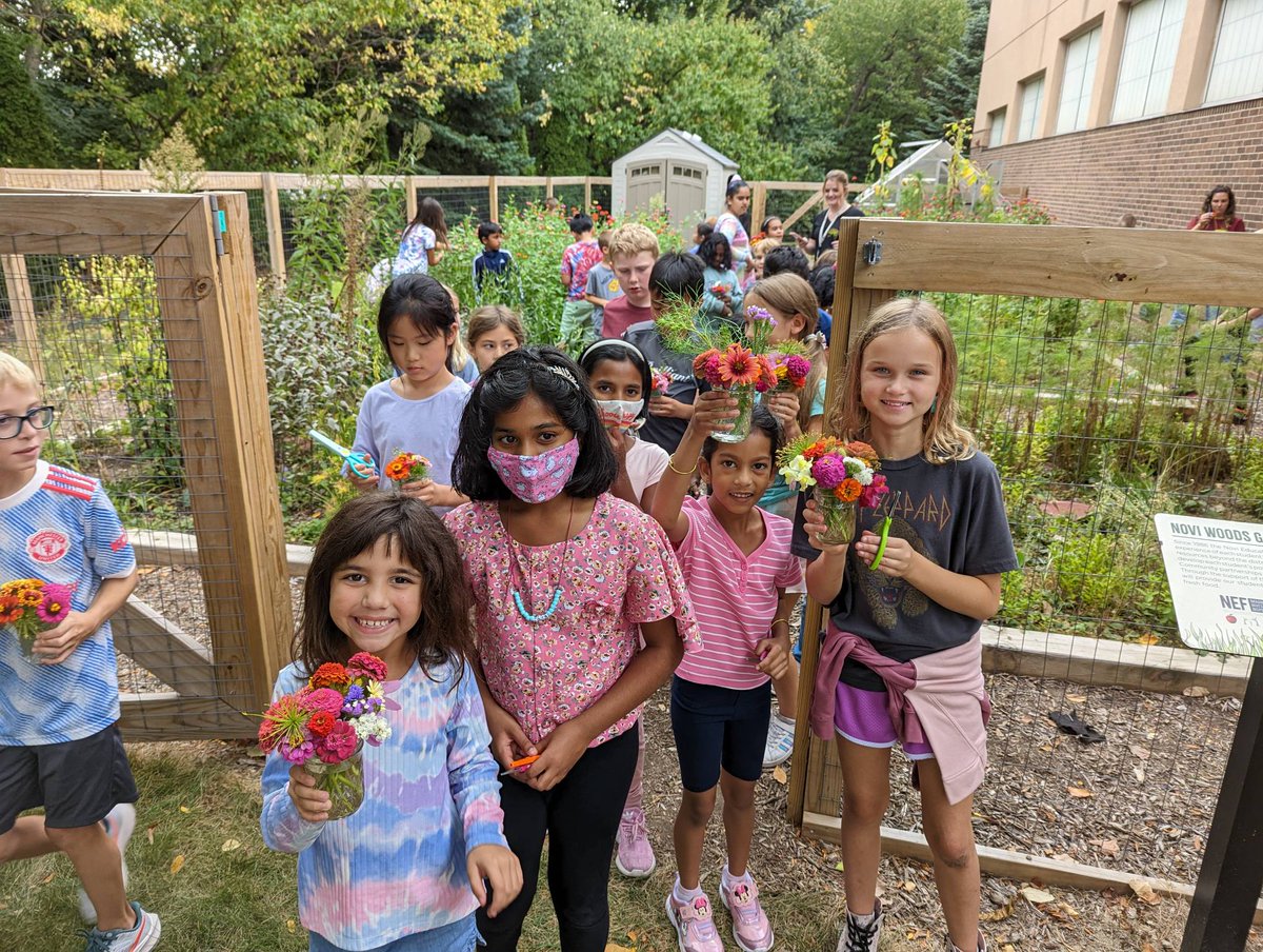Using our @NoviEdFoundgarden to  cut flowers to give away to our community! #NWLeads #NoviPride