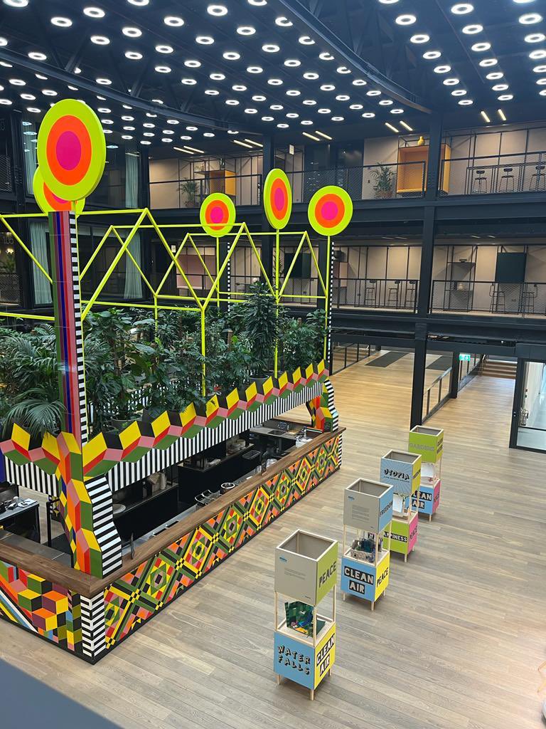 Accumulate_Ldn's tweet photo. What a setting! Thrilled to see our #UtopiaProject exhibited at 1 Finsbury Ave in the City as part of the @OpenCityLondon weekend. Big thanks to @AHMMArchitects! It looks fantastic! #artschoolforthehomeless https://t.co/zLpDAege89