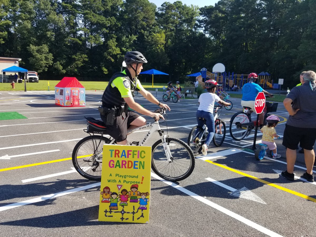 YouGoPlan's tweet photo. The #trafficgarden at Lockhart Elementary in @KdaleNC with Tacarra Ingram and @SafeRoutesNC with Jennifer Delcourt was a smashing success. Next up for me @bikewalknc annual #TransportationSummit dedicating a permanent structure at Hillcrest Park Traffic Garden @wintervillenc https://t.co/soCrK7u8UY