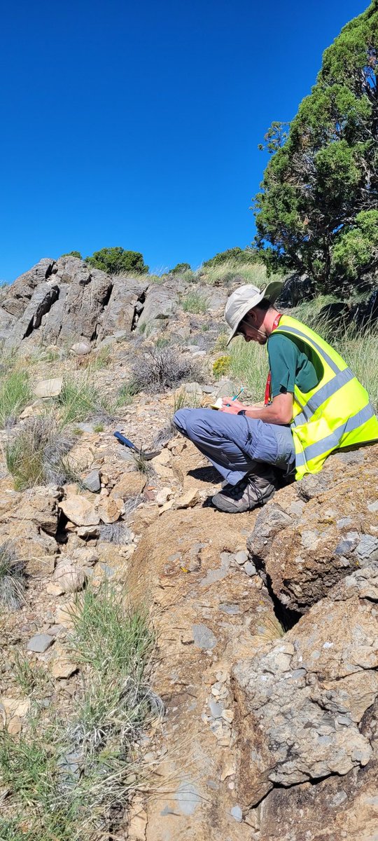 rockswhisperer's tweet photo. I eat certian junkfoods only during  #fieldwork so I don't over extend myself mapping in The Three Peaks, Utah. Daniel does not have such food restrictions. The "Eye of Sauron" commanded me to collect this sample of the Marshall Creek breccia. #geology #EdMap https://t.co/36YU57zgrW