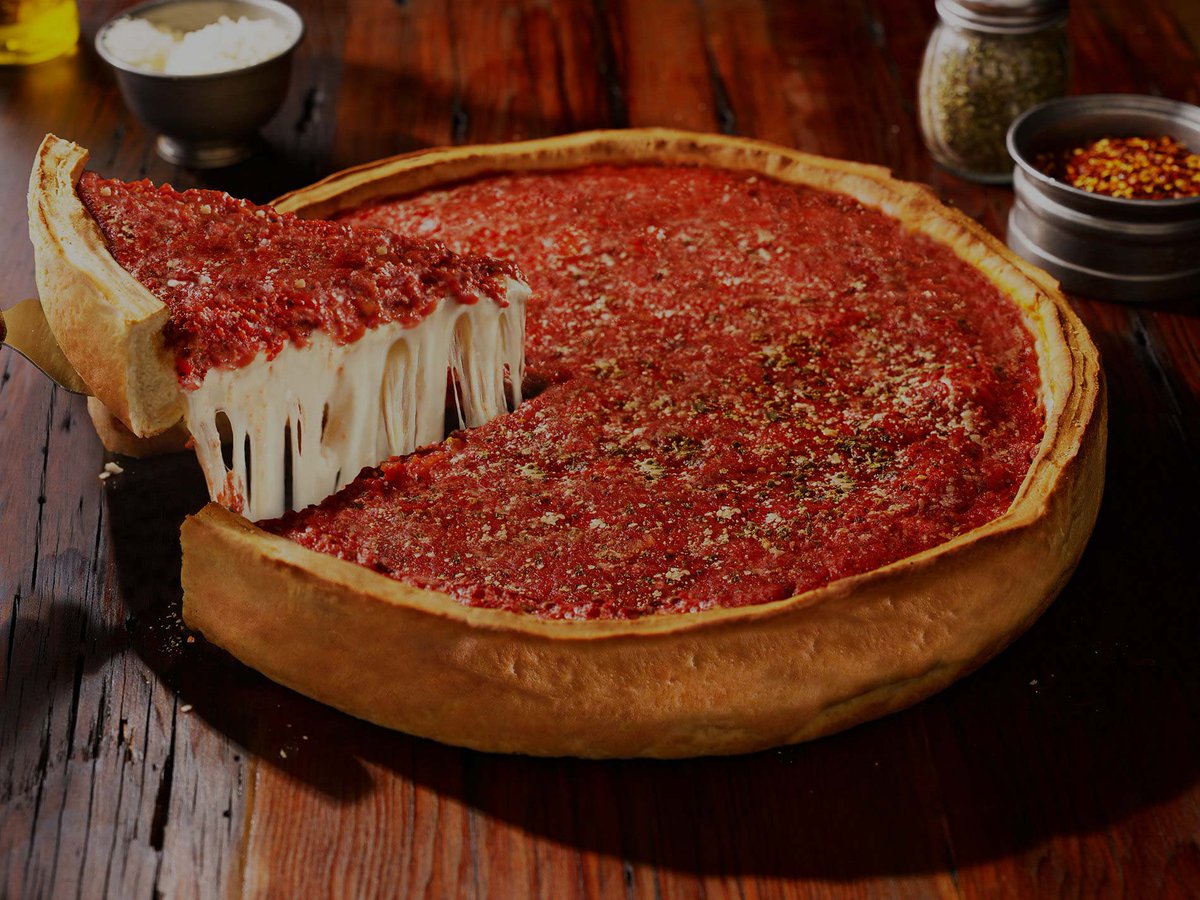DanielAshley13's tweet photo. #OnlyAFoolWouldThink This thick Chicago pizza with mostly crust and no cheese on top is better than the New York pizza on the right that is easy to eat with your hands, and has a perfect balance of sauce, cheese & crust. https://t.co/ucC7RRj7zx