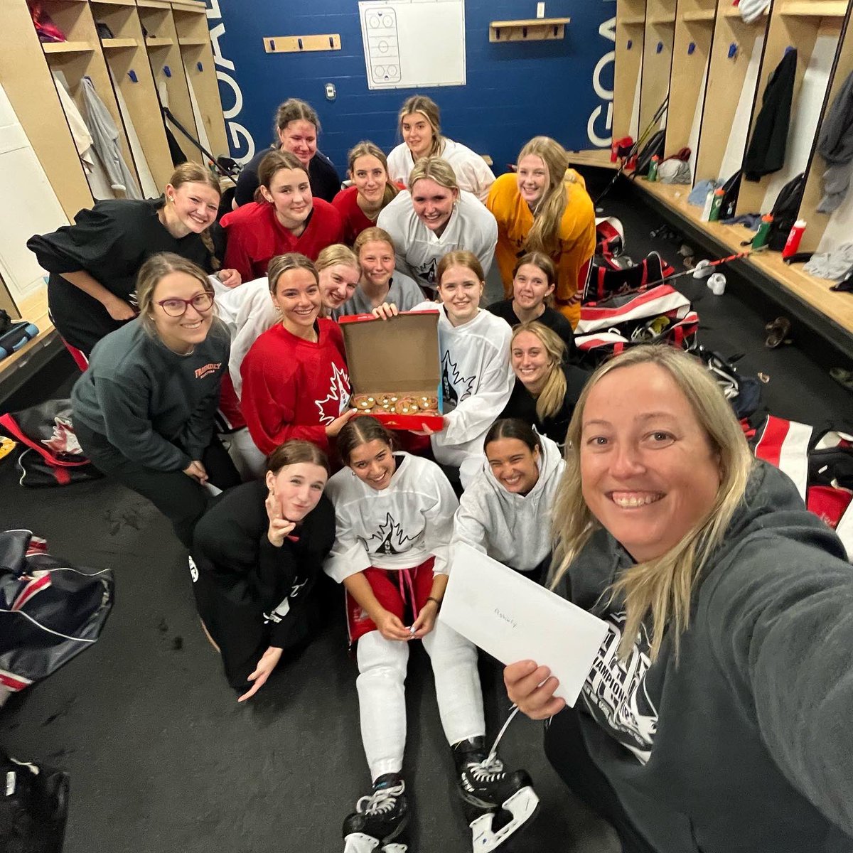WinnipegAvros's tweet photo. The Vros surprised their coaches after practice today to say Happy #NationalCoachesWeek 
Thank you Coach Kira, Tess, Ash &amp; Gord! ❤️🖤🤍 @SportManitoba @hockeymanitoba https://t.co/XCXbpVH9cy
