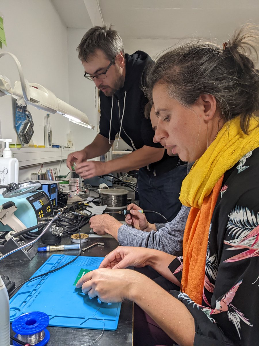 bsidesTLL's tweet photo. Yesterday evening our awesome team of organisers and volunteers got together to solder the first 20 badges at https://t.co/NdBl33eCwi. 
Soldering stations are waiting for you at the event! https://t.co/Lk4rqadUo7