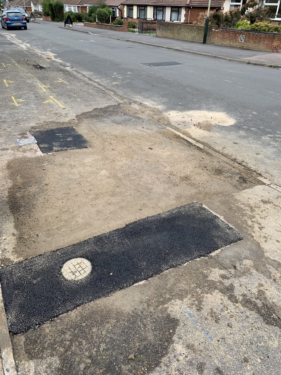 gavinjerman's tweet photo. @stwater the team that filled in the holes after your repair have left a right old mess of the pavement (I’ve cleared the mess on my drive). Will you get someone to clean it up and collect your barriers and signs that are partially blocking my entrance. ASAP please, thanks. https://t.co/9tx1UHXYIz