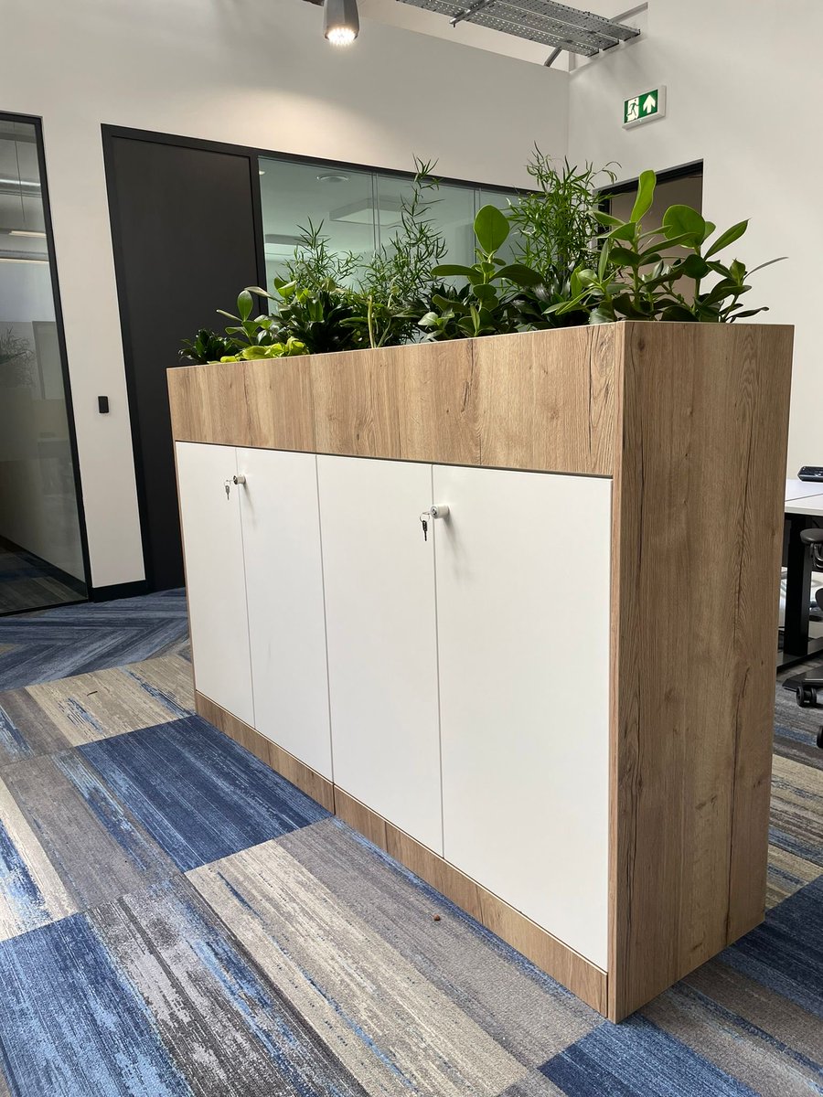 Another great bespoke storage project this time with planter above. Does your office give you a fix of flora?!