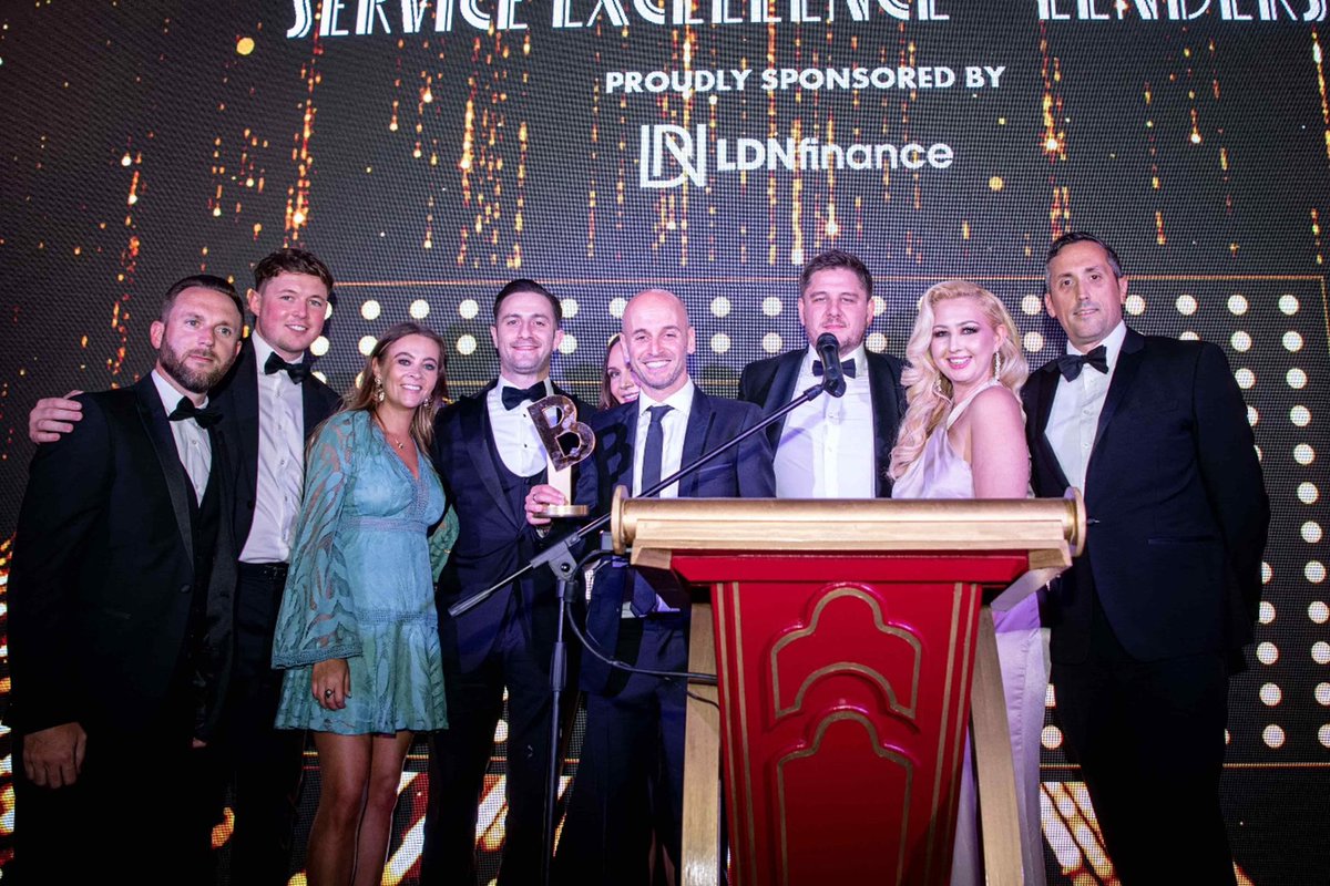 BandCNews's tweet photo. The @MTFinance team looking remarkable accepting their award for (Lender) Service Excellence at last week’s Bridging &amp; Commercial awards! #BCAwards2022 👌 https://t.co/JBWR3y2ttA