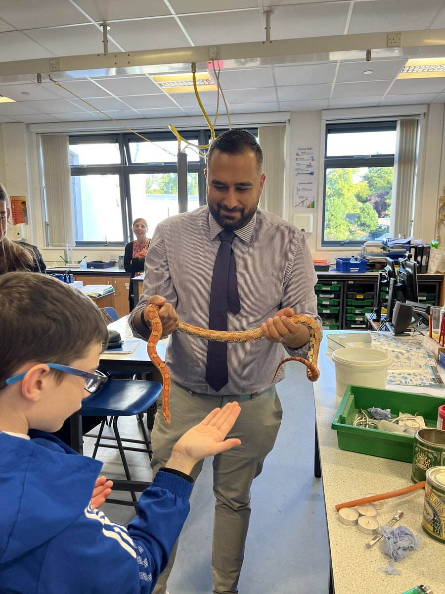 We had a slithery visitor to some classes in the department. Thanks to Dr Campbell for bringing in Slinky, the corn snake! She is a big hit with the pupils! Here are some pupils from Science class 2G. <a href="/Grove_Academy/">Grove Academy</a>
