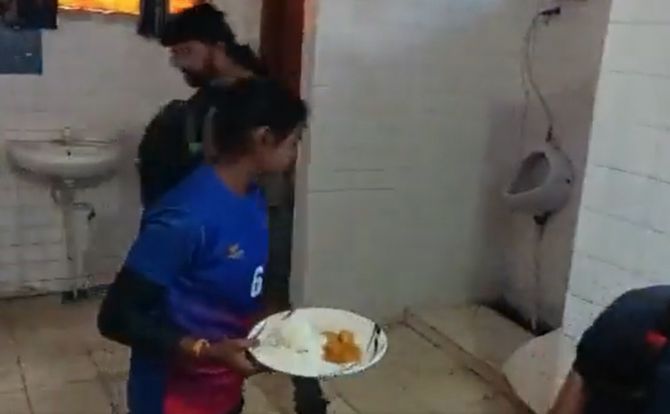 K_Nageshwar's tweet photo. Junior kabaddi players were served food from containers kept inside the toilet in Uttar Pradesh. This only reveals how sports and players, especially, not so popular ones are treated in our country. Just compare how cricket players are treated. It's atrocious. https://t.co/9NUtaNAXjT