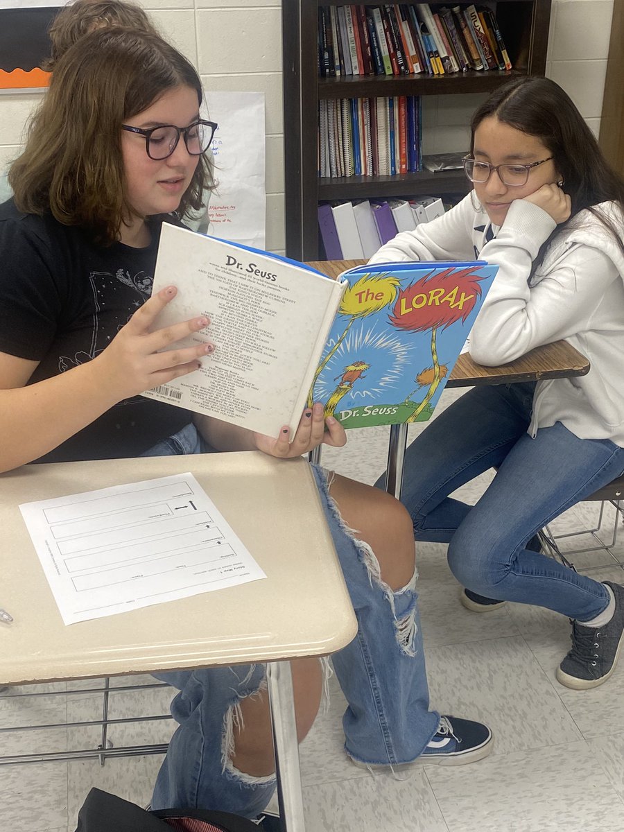 MsBaerELA's tweet photo. 9th grade Lit analyzing narrative structure in an unexpected format… picture books! My mother @GA_Baer read some of these exact copies to me when I was little ❤️ Glad to see my students getting a kick out of them now, almost three decades later! https://t.co/G3Pwy1DqnP