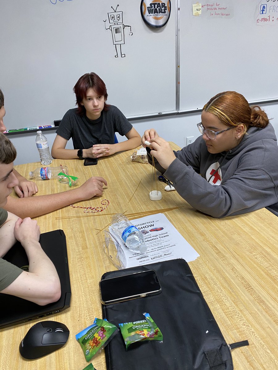 First robotics meeting of the season.  First assignment of the season…the marshmallow challenge! Build a free standing structure using a marshmallow, 20 pieces of spaghetti, a 3’ piece of tape and a 3’ piece of string