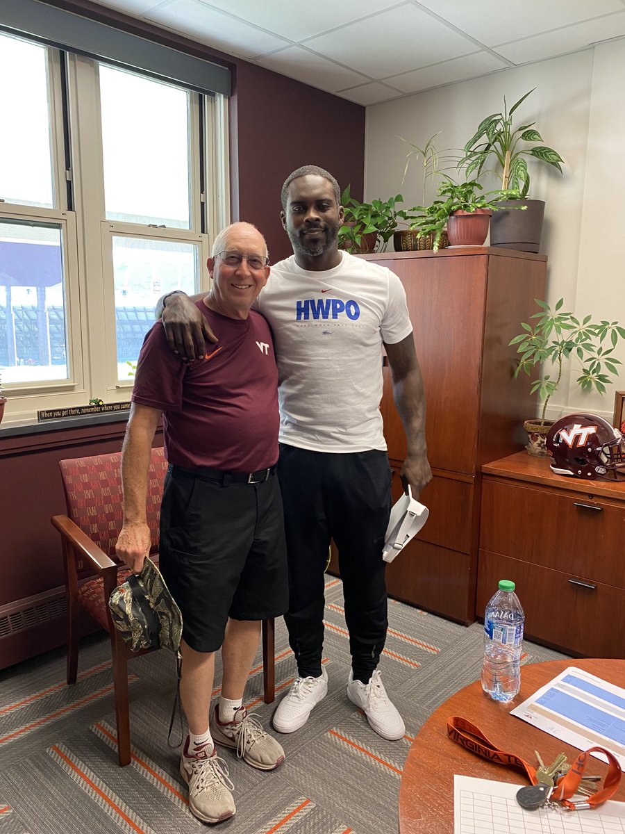 VT_groundscrew's tweet photo. Michael Vick with the Legend https://t.co/DYXmPusExN