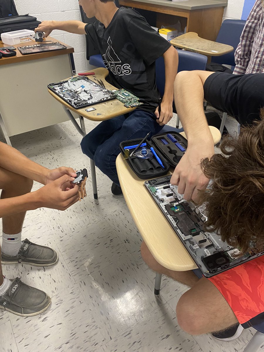 WEHSSTLP's tweet photo. Kids have spent the time learning how to properly repair our Chromebooks. Their final assessment is here and two are taking on the challenge! https://t.co/bxZQh6UfIn