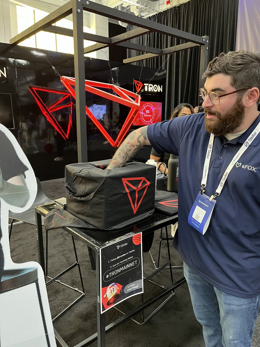 trondao's tweet photo. We heard a lot of folks want some #TRON #SWAG? Well, you're in luck, the team will be doing a raffle! 🔥
 
Come check out our mystery box for a chance to win! 🎉
 
OR take a photo in our photo booth and receive a FREE T-shirt! 👕 https://t.co/0Bukwp6nxz
